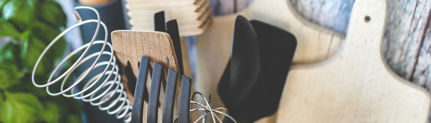 Kitchen tools with rustic background