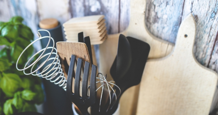 Kitchen tools with rustic background