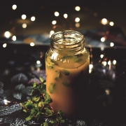 Bone Broth in a mason jar with herbs