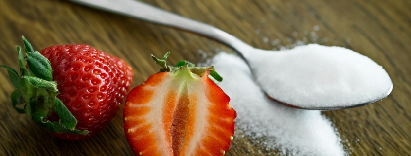Sweeteners teaspoon and strawberry
